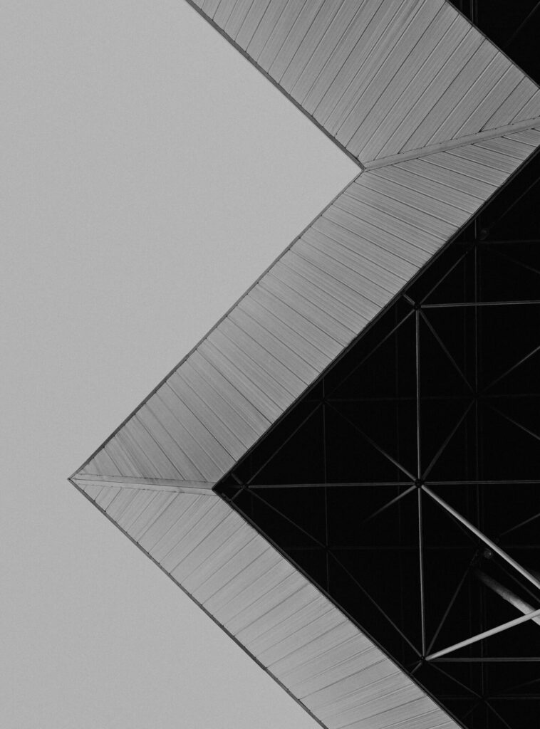 Minimalist black and white photo of abstract geometric architecture with a modern style.